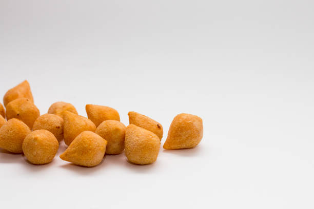 Brazilian appetizer Brazilian appetizer on white background coxinha stock pictures, royalty-free photos & images
