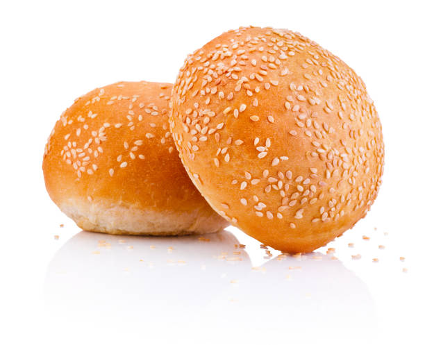 istock Two sandwich bun with sesame seeds isolated on white background 823394036