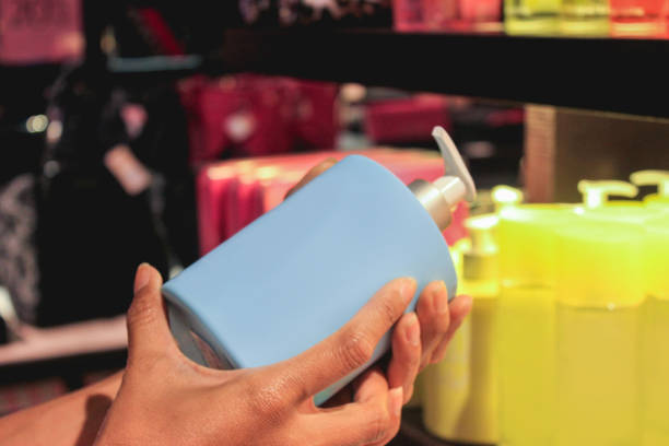 istock Young women choosing liquid body soap 823394318