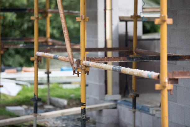 istock Scaffolding on building site with build in distance 823397778