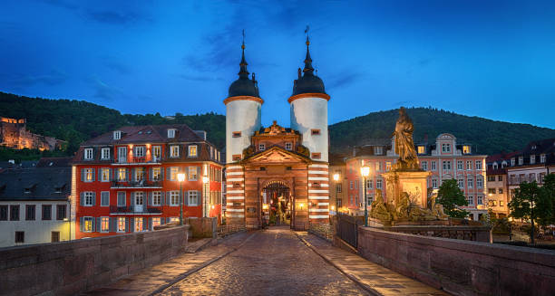 istock Illuminated Old Bridge Gate in Heidelberg, Germany 823399718