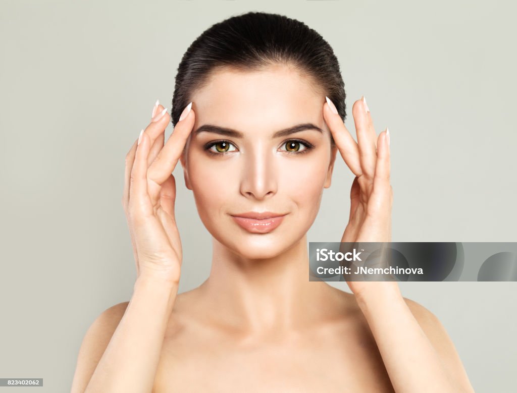 Perfect Model Woman with Healthy Skin. Spa Beauty, Facial Treatment and Cosmetology Concept Human Face Stock Photo