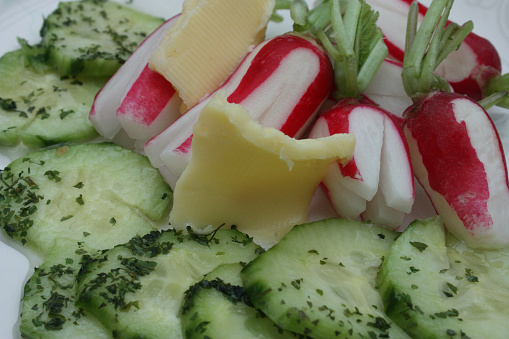 Rawness  Radish Cucumber in slices  salted butter
