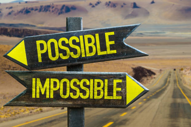 possible x impossible - success failure dreams road sign imagens e fotografias de stock