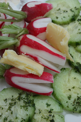 Rawness  Radish Cucumber in slices  salted butter