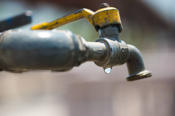 istock Closed water faucet but water leakage 823407046