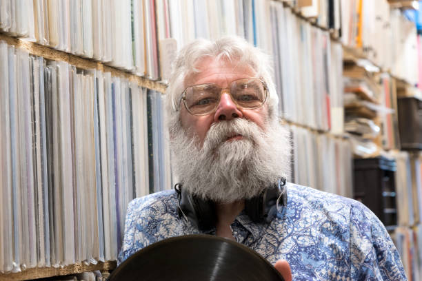 istock Record collector in front of his collection 823410606