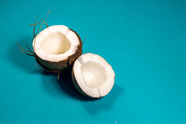 Coconut with half and leaves