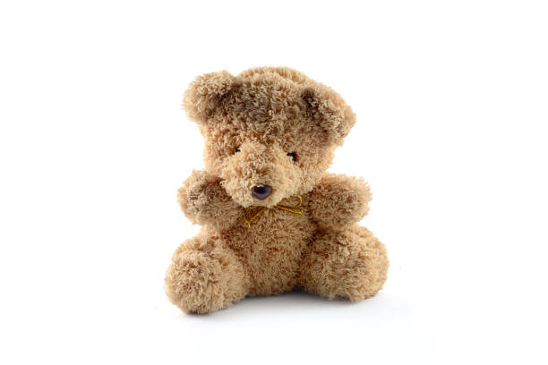 solitario orso bambola isolare - orsacchiotto foto e immagini stock