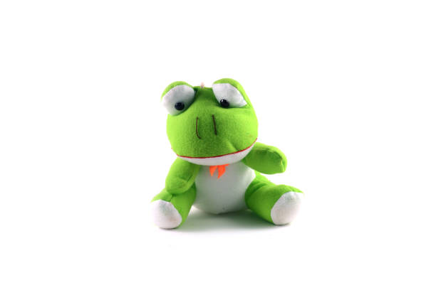 zielona żaba lalka z białym tłem - behavior teddy bear doll old zdjęcia i obrazy z banku zdjęć