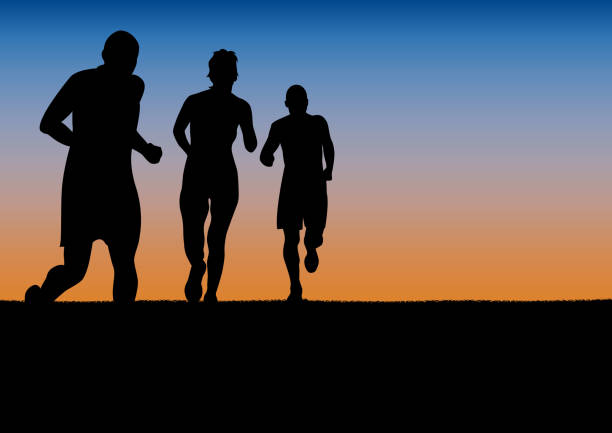istock runners, marathon in the city on sunset,  poster background 823441358