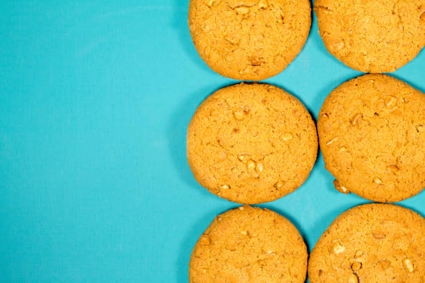 istock Fresh baked peanut cookies on rustic background 823447388