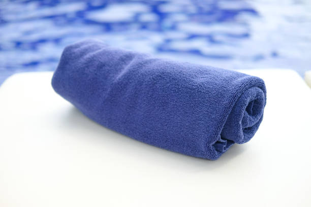istock Blue towel on bed pool at the swimming pool. 823447636