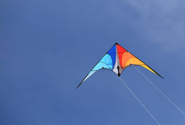 istock Colorful kite in blue sky 823450928
