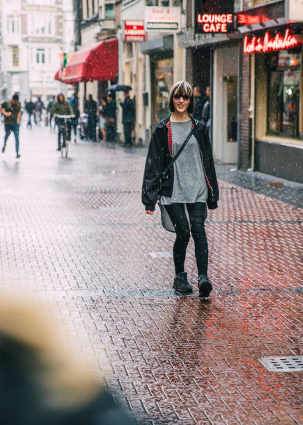 istock Woman Walking Through Amsterdam 823465932