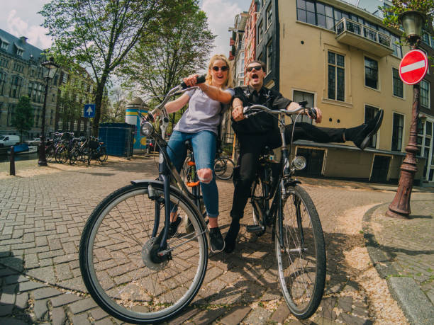 istock Friends Having Fun on their Bicycles in the City 823470898