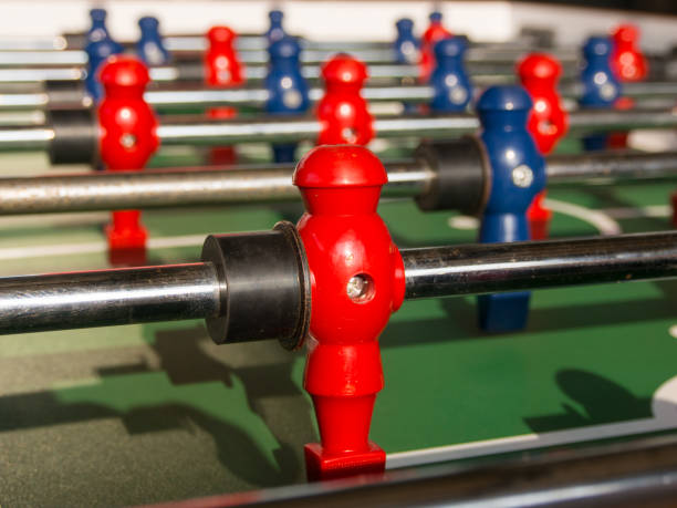 istock Table football game with red and blue players team 823497272