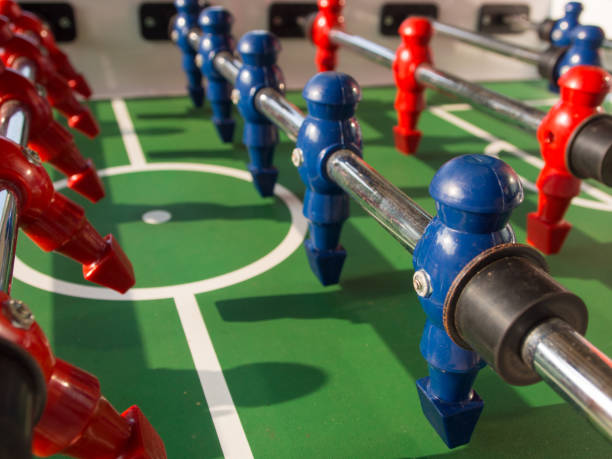 istock Table football game with red and blue players team 823497348