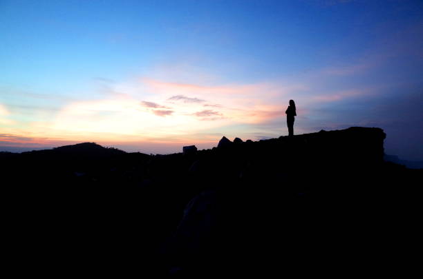 istock A woman standing on a volcano 823498688
