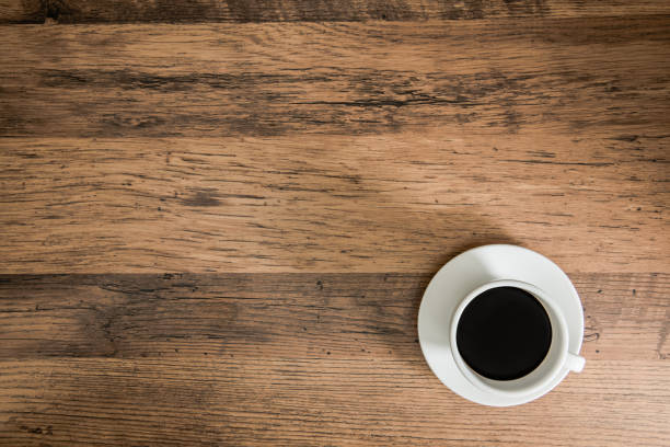 istock coffee on a wooden board table background 823505512