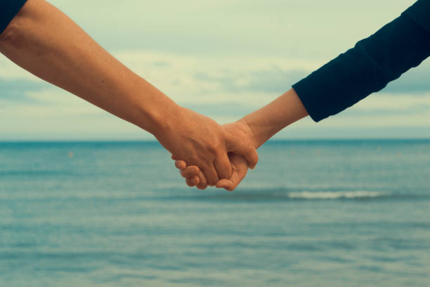 istock Mother and child holding hands 823505684