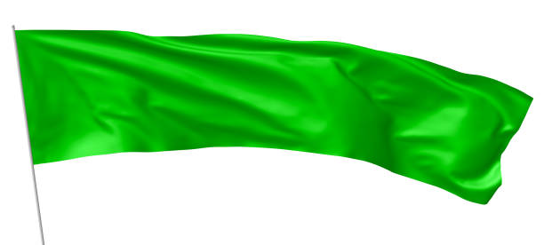 istock Long green flag with flagpole waving in wind 823507512