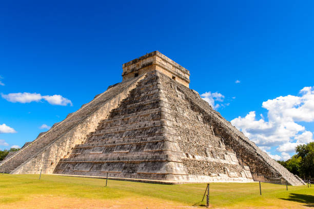 istock El Castillo (Temple of Kukulcan),  a Mesoamerican step-pyramid, Chichen Itza. It was a large pre-Columbian city built by the Maya people of the Terminal Classic period. UNESCO World Heritage 823511096
