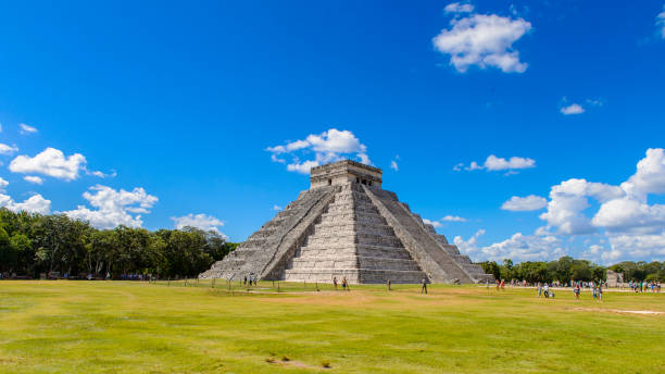 istock El Castillo (Temple of Kukulcan),  a Mesoamerican step-pyramid, Chichen Itza. It was a large pre-Columbian city built by the Maya people of the Terminal Classic period. UNESCO World Heritage 823514026