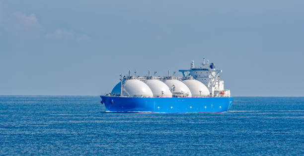 LNG tanker is passing by Singapore Strait. Liquefied natural gas (LNG) tanker is passing by Strait of Singapore. storage tank photos stock pictures, royalty-free photos & images