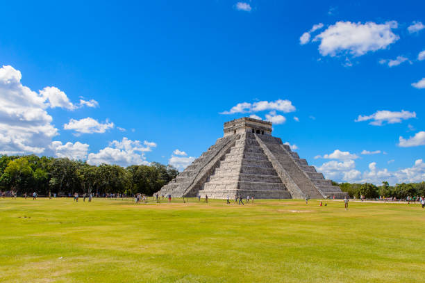 istock El Castillo (Temple of Kukulcan),  a Mesoamerican step-pyramid, Chichen Itza. It was a large pre-Columbian city built by the Maya people of the Terminal Classic period. UNESCO World Heritage 823514098