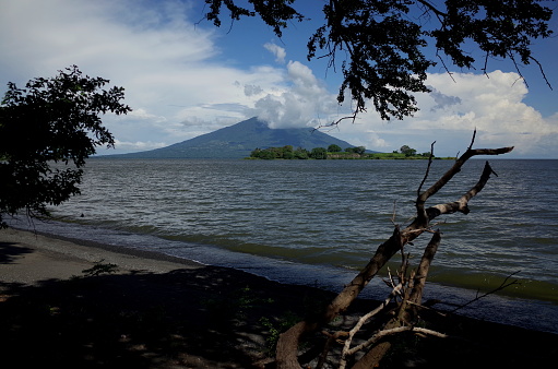 A view of Volcan Maderas from the black volcanic sand beach of Isla Ometepe
