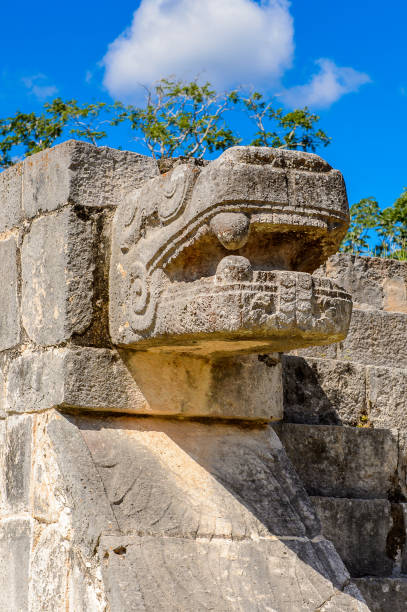 istock Plumed Serpent, Venus Platform, Chichen Itza, Tinum Municipality, Yucatan State. It was a large pre-Columbian city built by the Maya people of the Terminal Classic period. UNESCO World Heritage 823514276