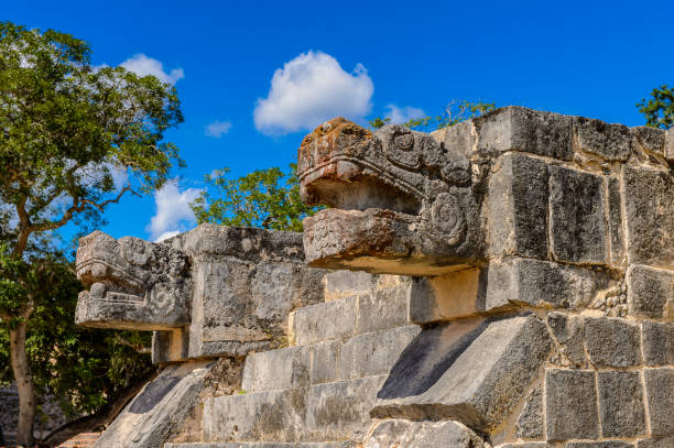 istock Plumed Serpent, Venus Platform, Chichen Itza, Tinum Municipality, Yucatan State. It was a large pre-Columbian city built by the Maya people of the Terminal Classic period. UNESCO World Heritage 823514320