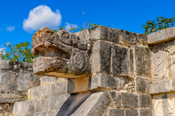 istock Plumed Serpent, Venus Platform, Chichen Itza, Tinum Municipality, Yucatan State. It was a large pre-Columbian city built by the Maya people of the Terminal Classic period. UNESCO World Heritage 823514340