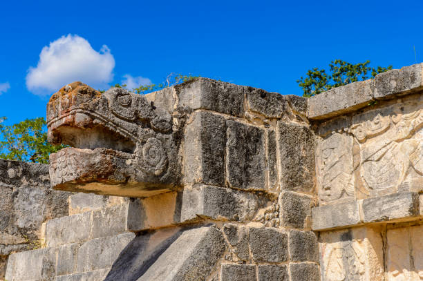istock Plumed Serpent, Venus Platform, Chichen Itza, Tinum Municipality, Yucatan State. It was a large pre-Columbian city built by the Maya people of the Terminal Classic period. UNESCO World Heritage 823514348