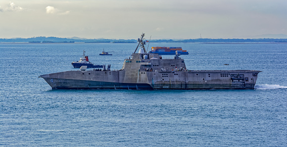 The USN Independence-class littoral combat ship passes Singapore Strait.