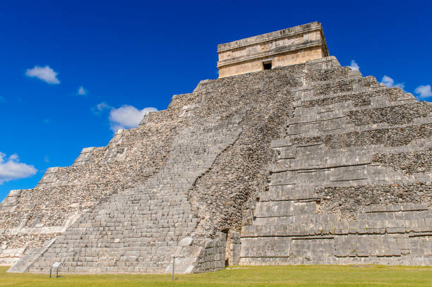 istock El Castillo (Temple of Kukulcan),  a Mesoamerican step-pyramid, Chichen Itza. It was a large pre-Columbian city built by the Maya people of the Terminal Classic period. UNESCO World Heritage 823514852