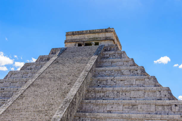 istock El Castillo (Temple of Kukulcan),  a Mesoamerican step-pyramid, Chichen Itza. It was a large pre-Columbian city built by the Maya people of the Terminal Classic period. UNESCO World Heritage 823514864