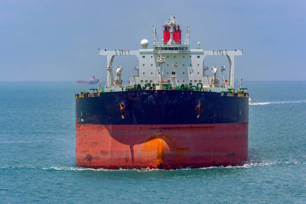 Frontal view of the bow of the crude oil tanker in the ballast passing through the Singapore Strait.