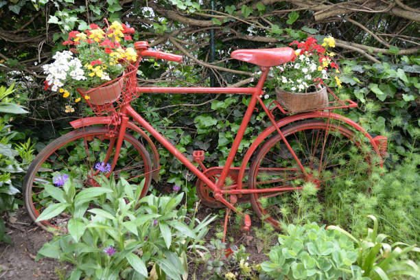 istock Red bicycle with flower decoration 823520404