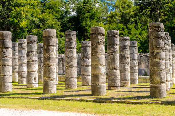 istock Group of thousands columns, Chichen Itza, Tinum Municipality, Yucatan State. It was a large pre-Columbian city built by the Maya people of the Terminal Classic period. UNESCO World Heritage 823524260