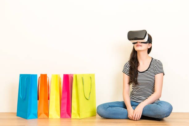 istock casual woman experience VR headset equipment 823525778