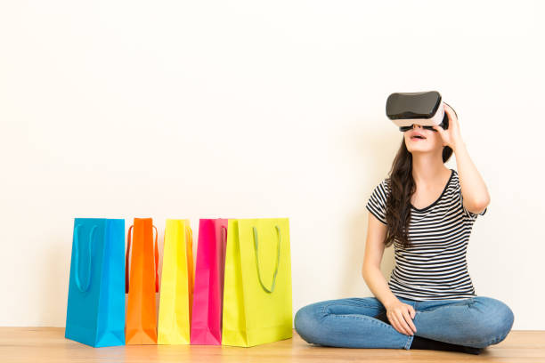 istock young girl adjusting the VR headset device 823525806
