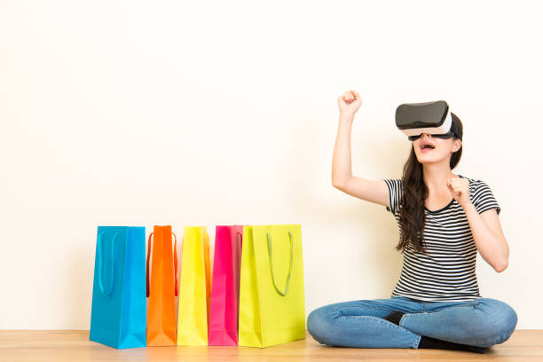 istock shopaholic woman using virtual reality equipment 823525818