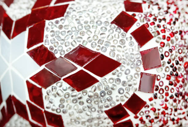 istock Textured fragment of stained glass with a geometric red-and-white pattern. 823529092