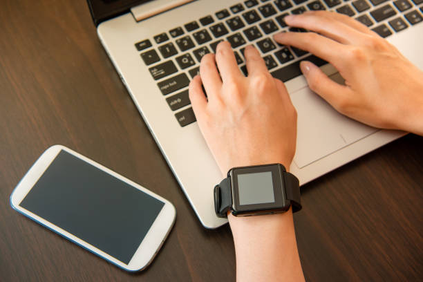 istock woman wearing smartwatch on the computer 823529204
