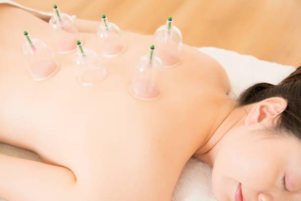 istock lying on chest with cupping treatment 823529522