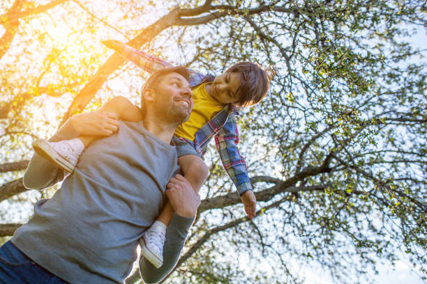 istock Father and son playing at the park 823534628