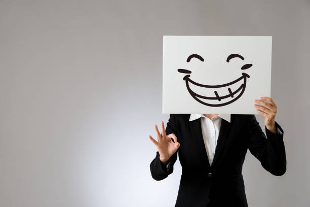 istock holding blank white board with ok hand gesture 823535474