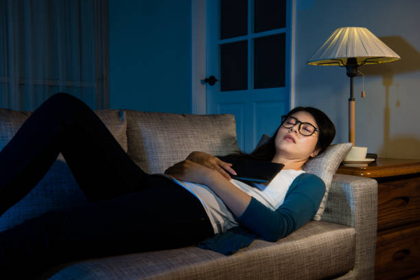 istock young businesswoman sleeping on the sofa 823540714